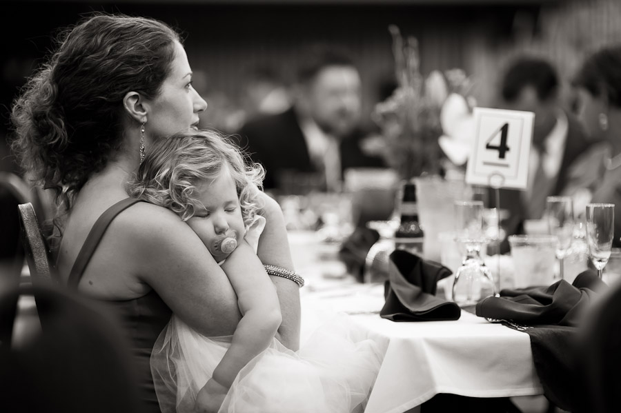 fun photo of a sleepy girl at a wedding 