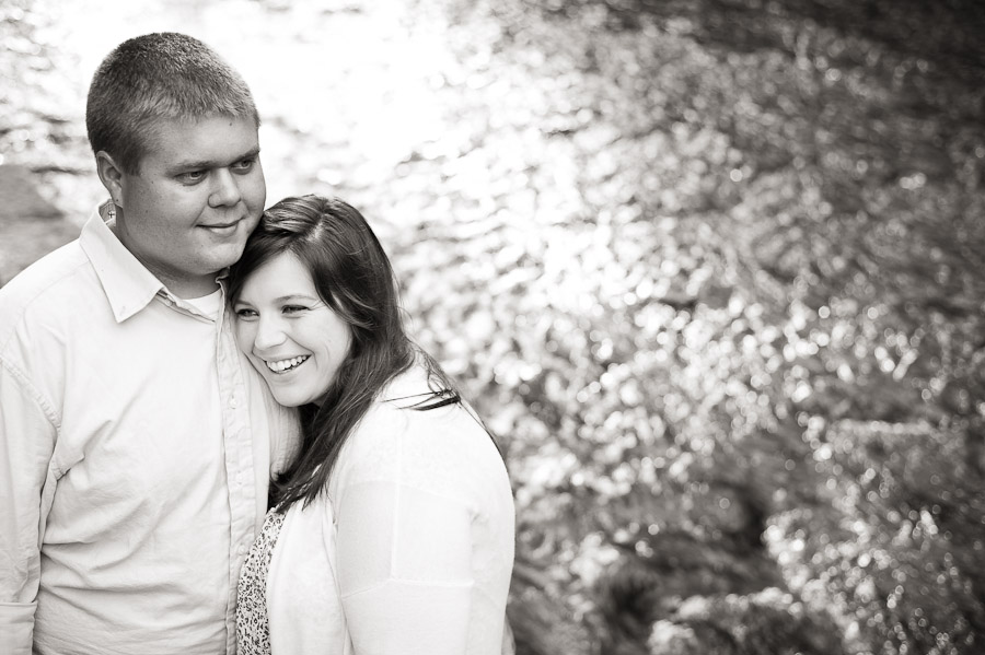 couple in front of creek at spring mill