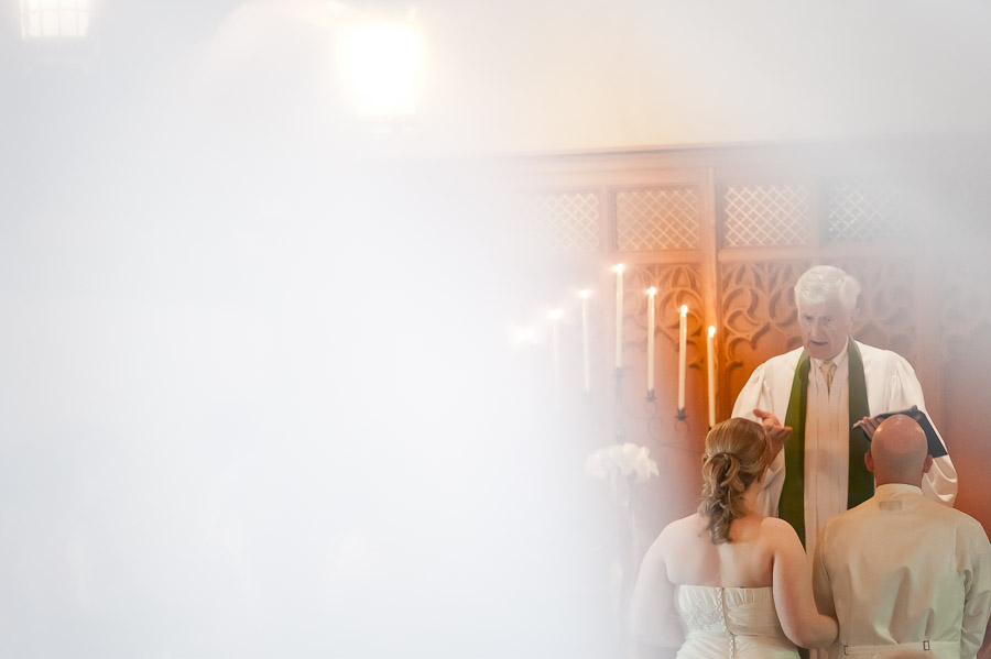 bride and groom in beck chapel during ceremony