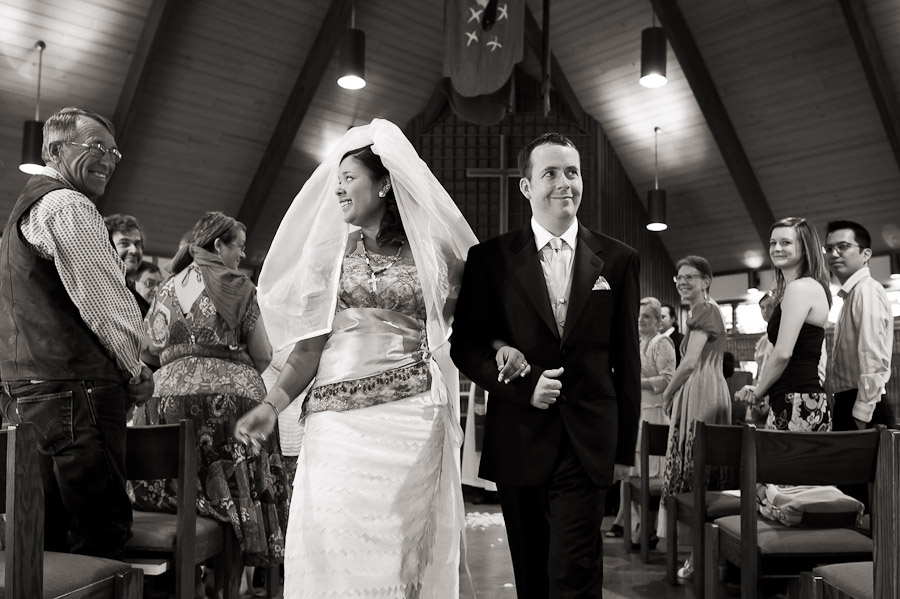 bride and groom exit at st thomas church diy gown