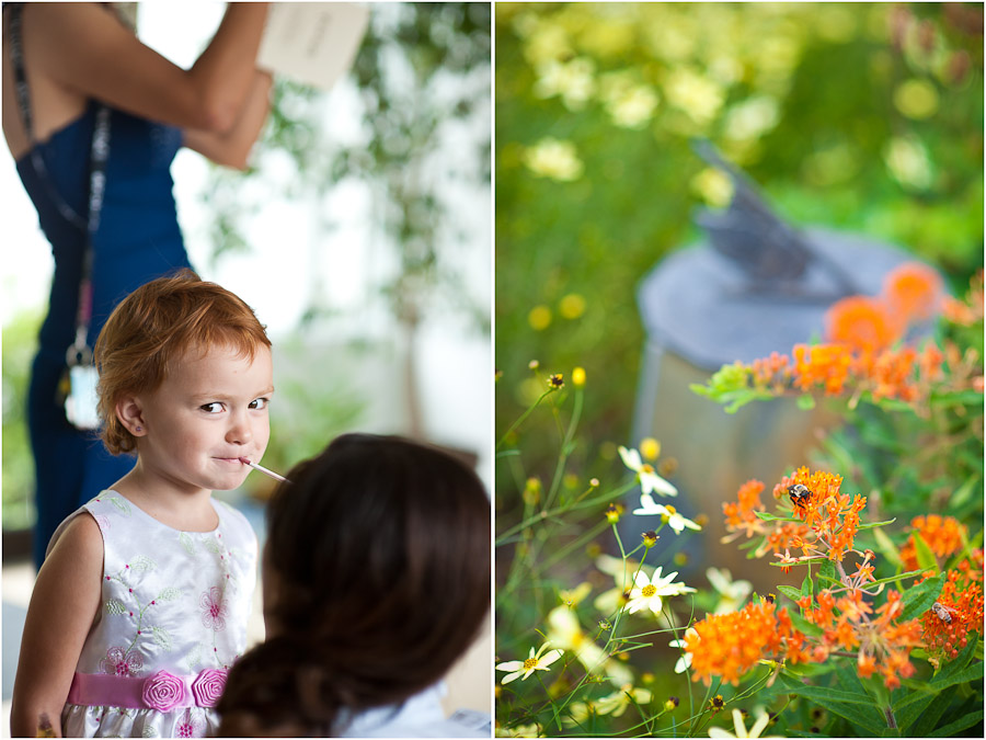 cute little girl getting lipstick put on at wedding