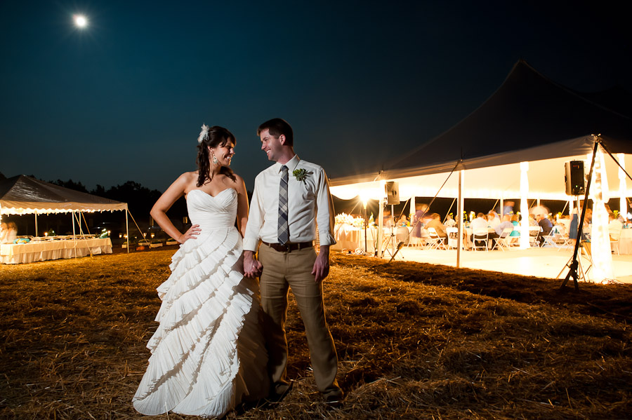 cool long exposure outdoor portrait of bride and groom at night