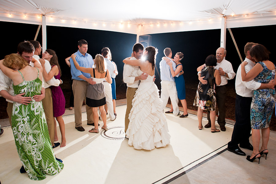 sweet moment during slow dance with bride and groom