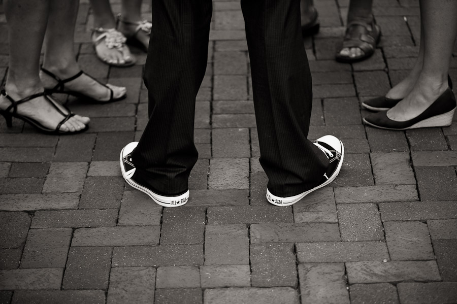 funny candid photo of shoes at wedding