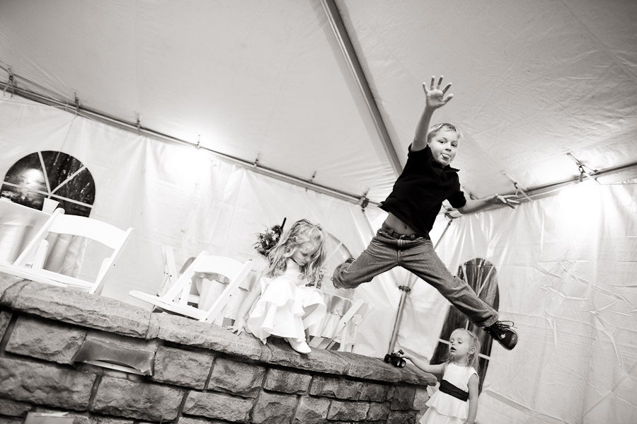 sweet jump by kid at wedding