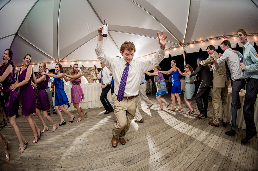 Funny dancing moment of groom