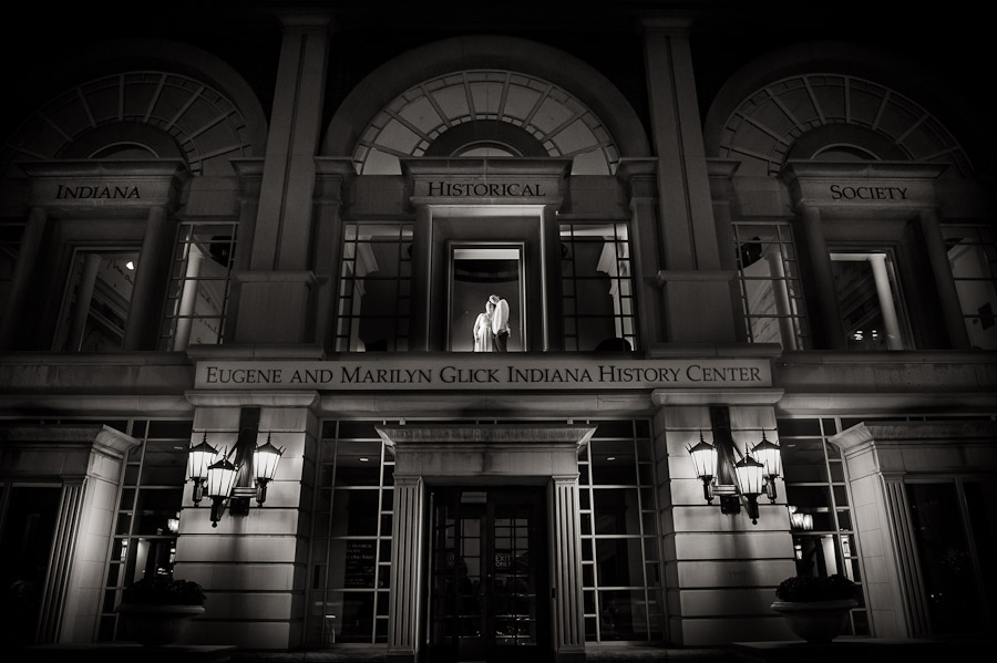 Romantic and dramatic epic portrait of bride and groom in downtown Indianapolis