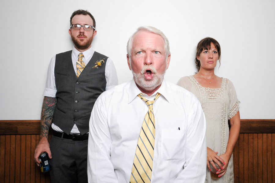 hilarious of bridal couple and officiant photobooth picture at Louisville wedding