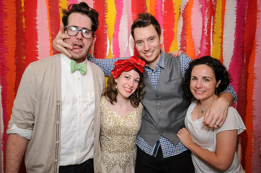 Fun and bright colors in photobooth at creative and unique wedding