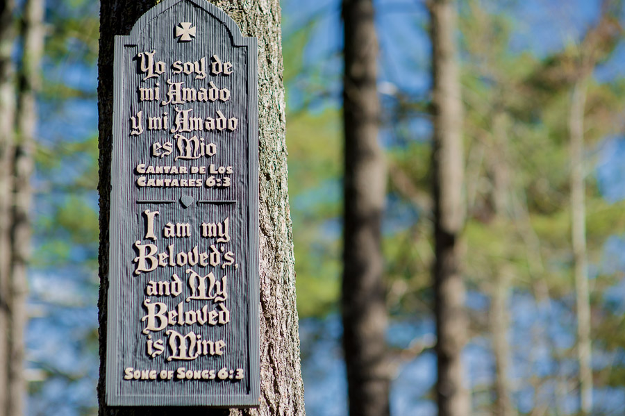 Photo of romantic, bilingual sign detail at Shrine Mont wedding