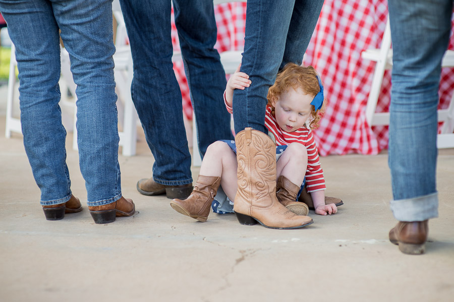 Cute, funny, kid portrait at casual BBQ wedding rehearsal dinner