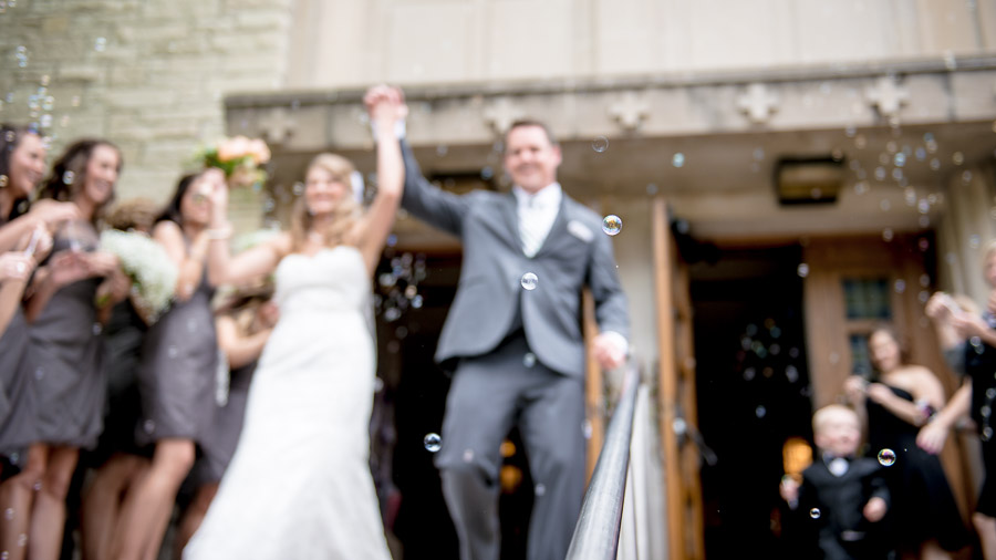 Artistic, classy wedding exit photo moment with bubbles in Indy