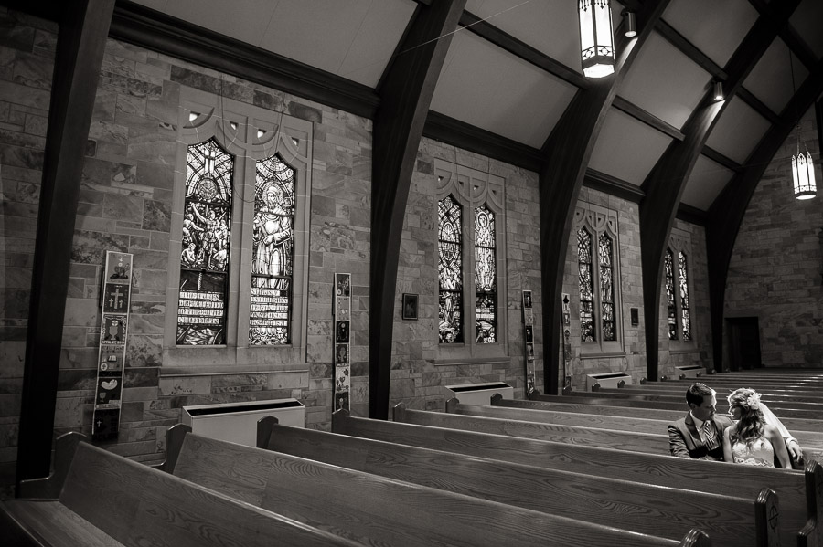 romantic, quiet wedding moment in sanctuary of Immaculate heart of st. mary in Indiana