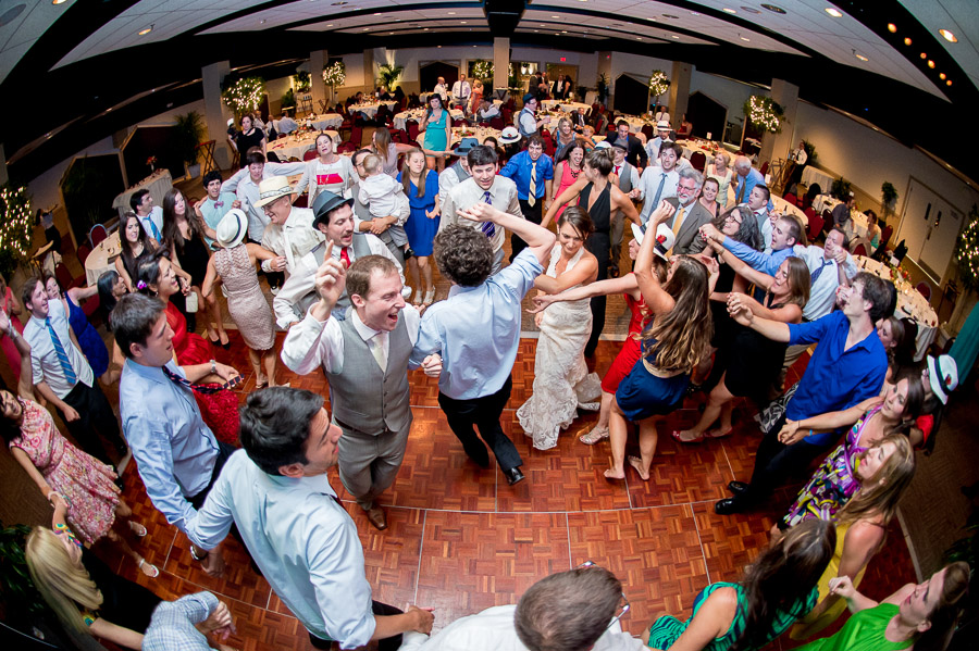 wild, fun, crowded dance floor at wedding reception in Virginia