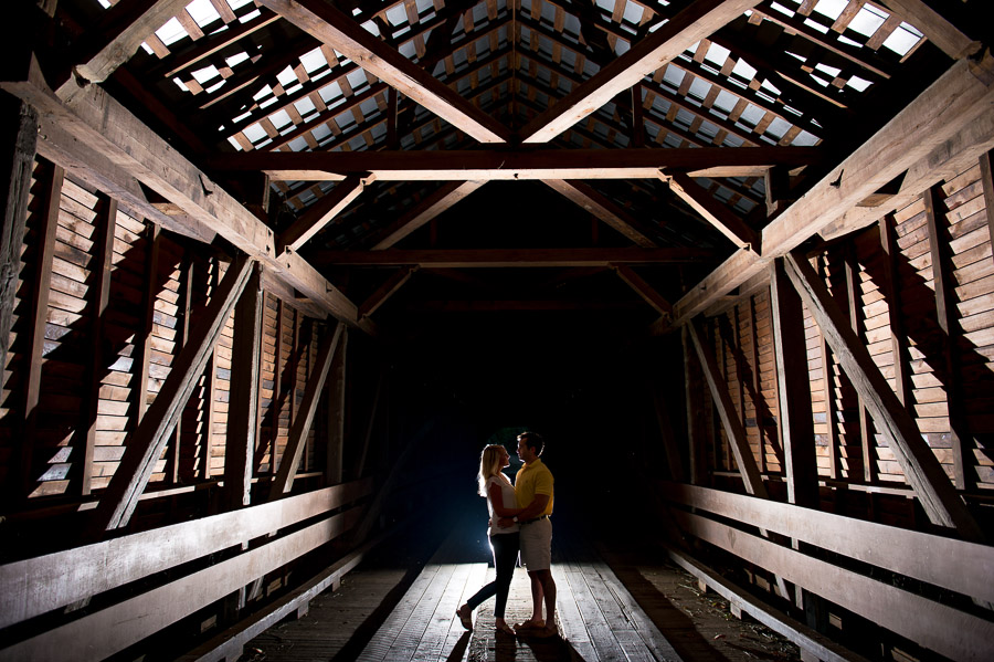 Dramatic, edgy, unique engagement photo at Meem's Bottom covered bridge in New Market Virginia