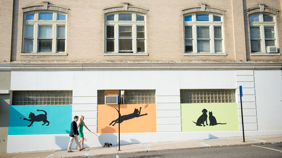 colorful, funky, fun engagement photo in downtown Harrisonburg Virginia