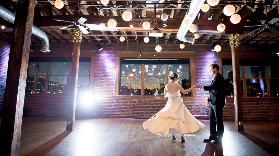 Fun first dance photo with twirling dress at Mavris Art Center wedding in Indiana