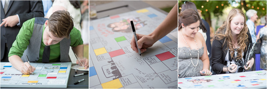 wedding guests sign in on homemade painted guestbook game board