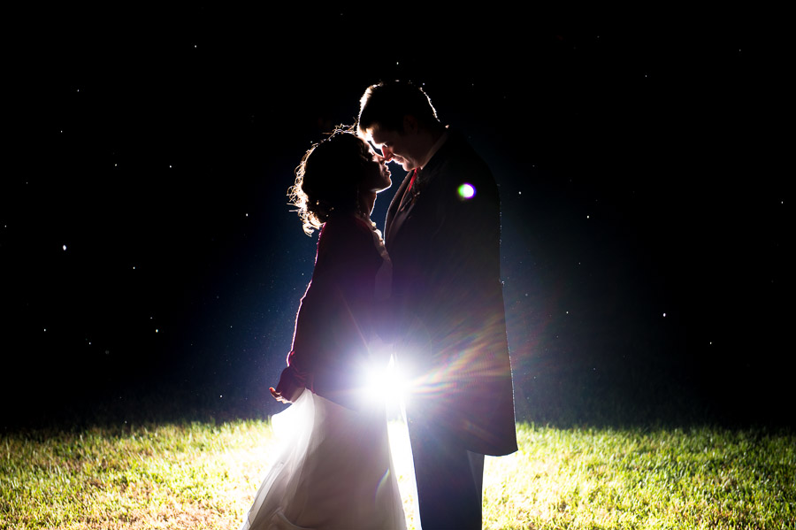 Awesome nighttime rainy wedding portrait by TALL+small.