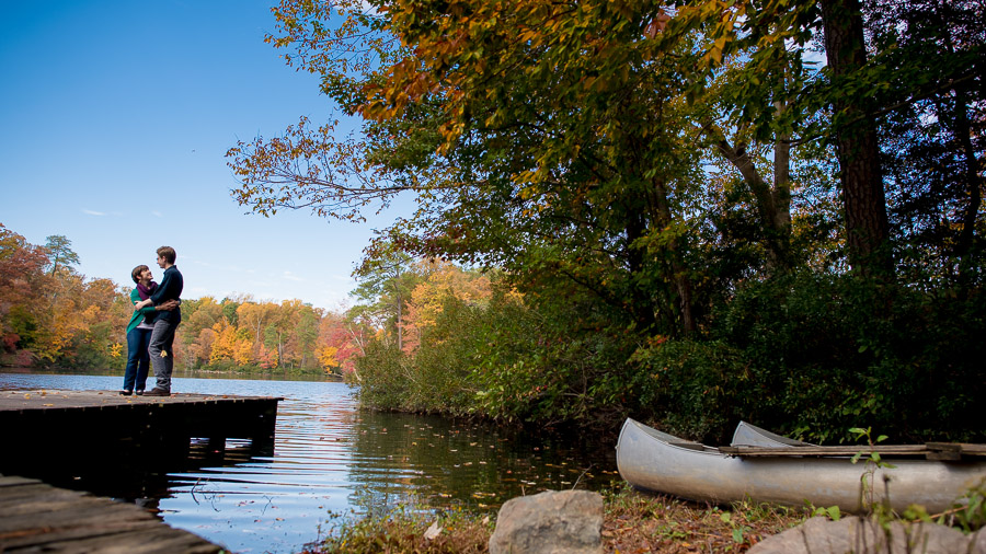 Colorful, fun, casual engagement photos by lake on William and Mary campus