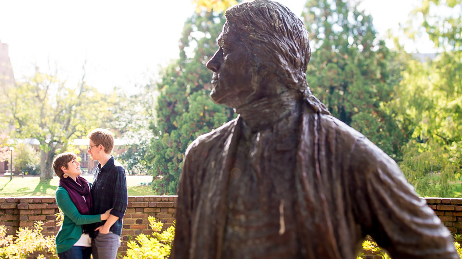 Silly and quirky engagement photo with Thomas Jefferson statue on William and Mary campus