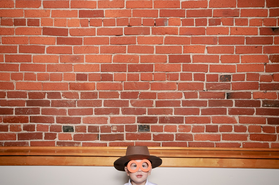 hilarious and cute little boy in photobooth at Indianapolis, Indiana wedding