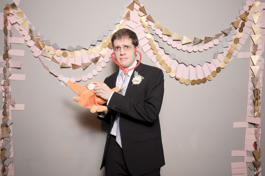 Very funny photobooth photo of chicken doctor at Indianapolis Indiana wedding