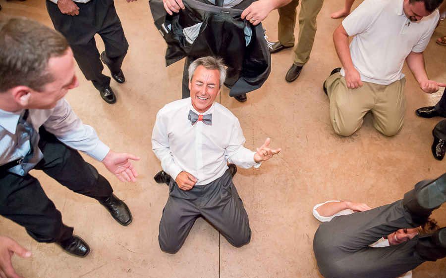 Epic father of the bride air guitar-ing at Northern Indiana wedding