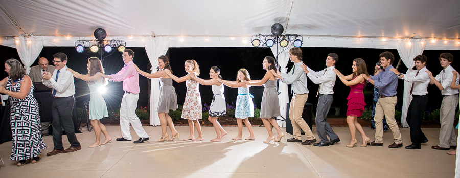 Happy, smiley, conga line photo by TALL + small Photography