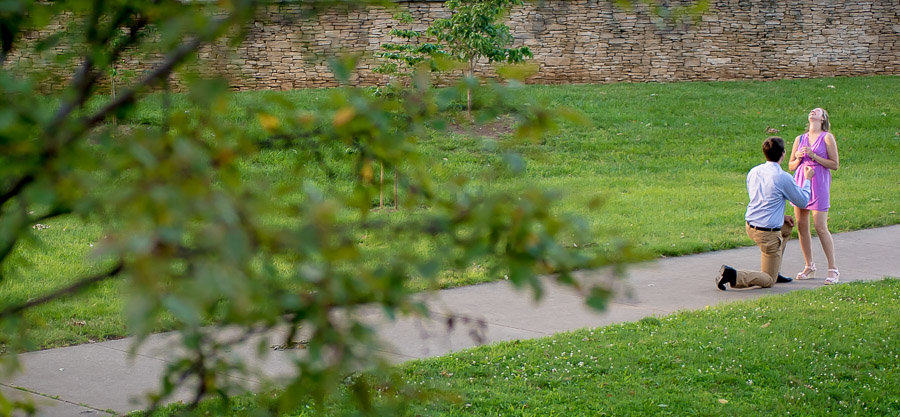 Sneaky proposal photo on Indiana University by engagerazzi TALL + small Photography