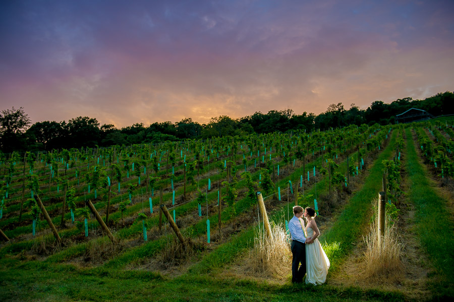 Colorful, beautiful sunset at Leesburg, VA winery wedding by TALL + small Photography