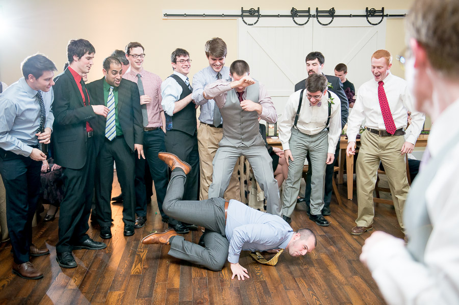 Hilarious moment of dude diving for garter at King Family Vineyard winter wedding