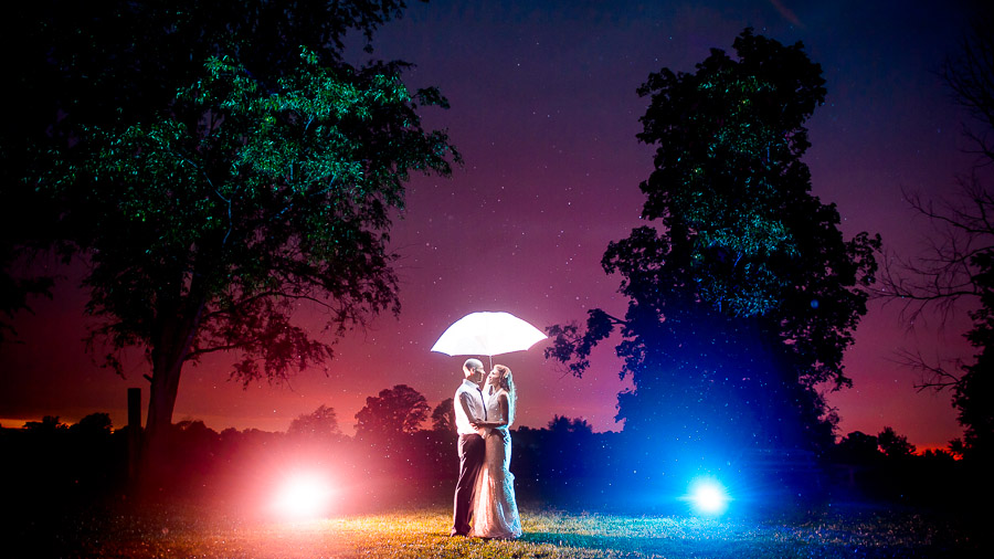 Amazing, colorful, and creative nighttime wedding portrait at Sycamore Farm in Bloomington by TALL+small Photography.