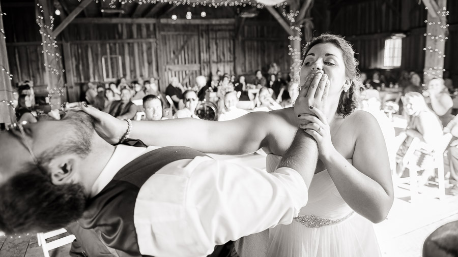 Hilarious cake cutting photo at Lafayette, Indiana wedding