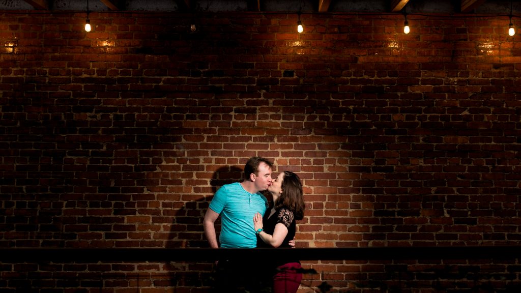 Rachel + Travis' spotlit on a rainy day