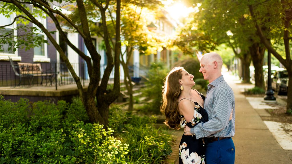 Becky + Rob snuggling for their Fan engagement photos.