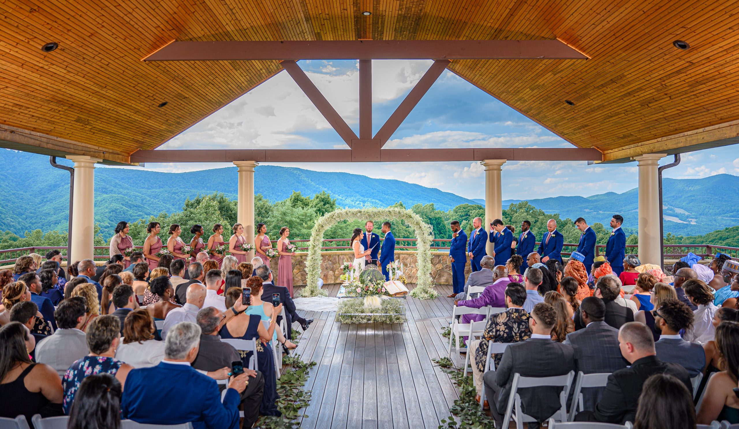 Panoramic photo of a wedding on the covered terrace at an Irvine Estate wedding in Lexington, Virginia.