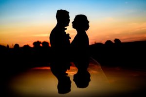 Silhouette reflection portrait of couple at their CrossKeys Vineyard wedding photography