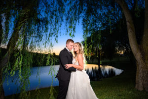 CrossKeys Vineyard Wedding Photo at night near the pond